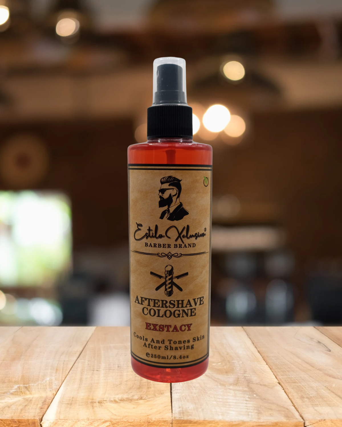 Bottle of aftershave cologne on a wooden surface with a blurred background