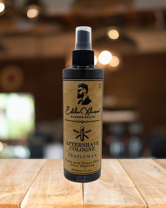 Aftershave cologne bottle on a wooden surface with a blurred background