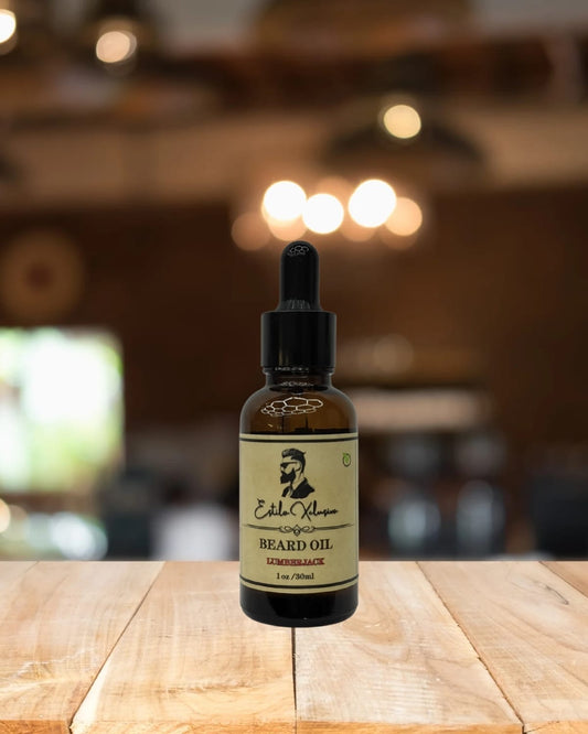 “Estilo Exclusivo Beard Oil – Lumberjack scent, lightweight beard conditioner, 1oz dropper bottle.”
